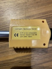 Portable HTP 1700 hardness tester with calibration cylinder and case
